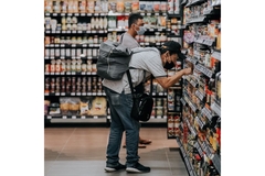 Image Man buys groceries at supermarket